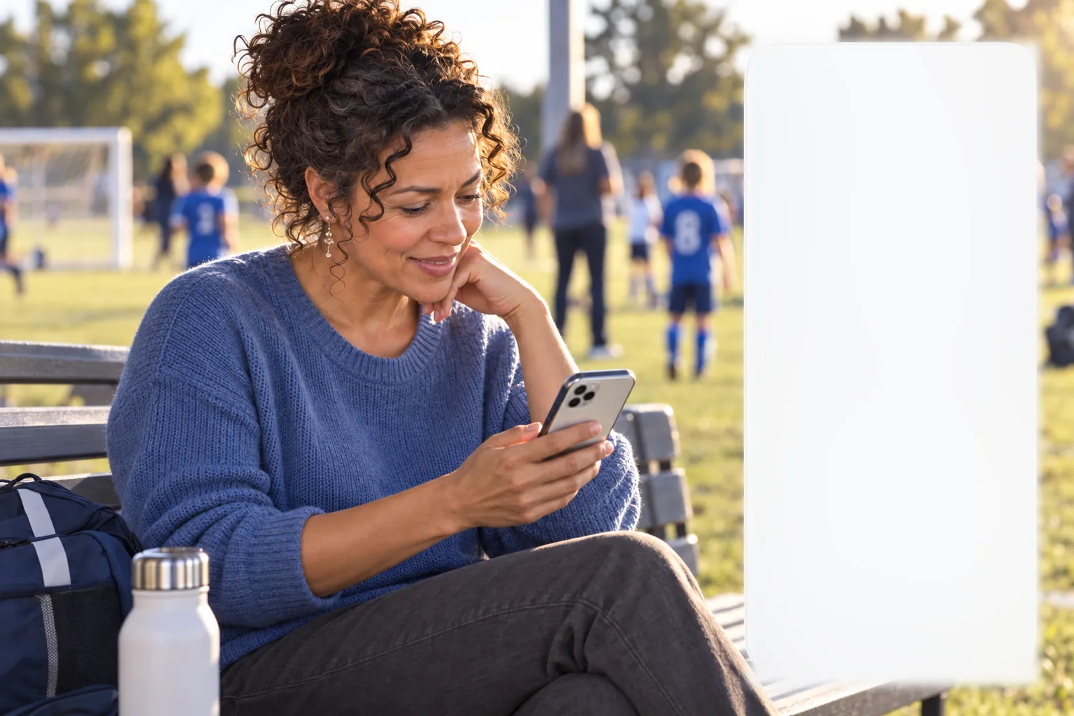 A new member at a soccer field with her training, messages and Robin open beside her.